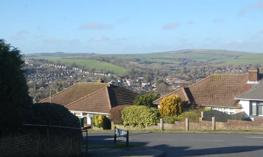 Tiled bungalow roofs on Beechwood Avenue, Brighton, looking over Westdene towards the South Downs